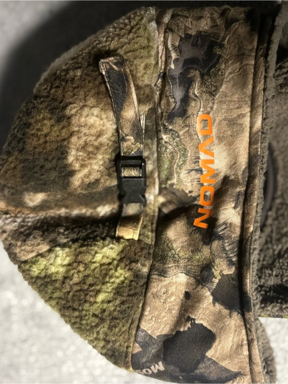Nomad Harvester camo billed beanie made of Berber fleece.